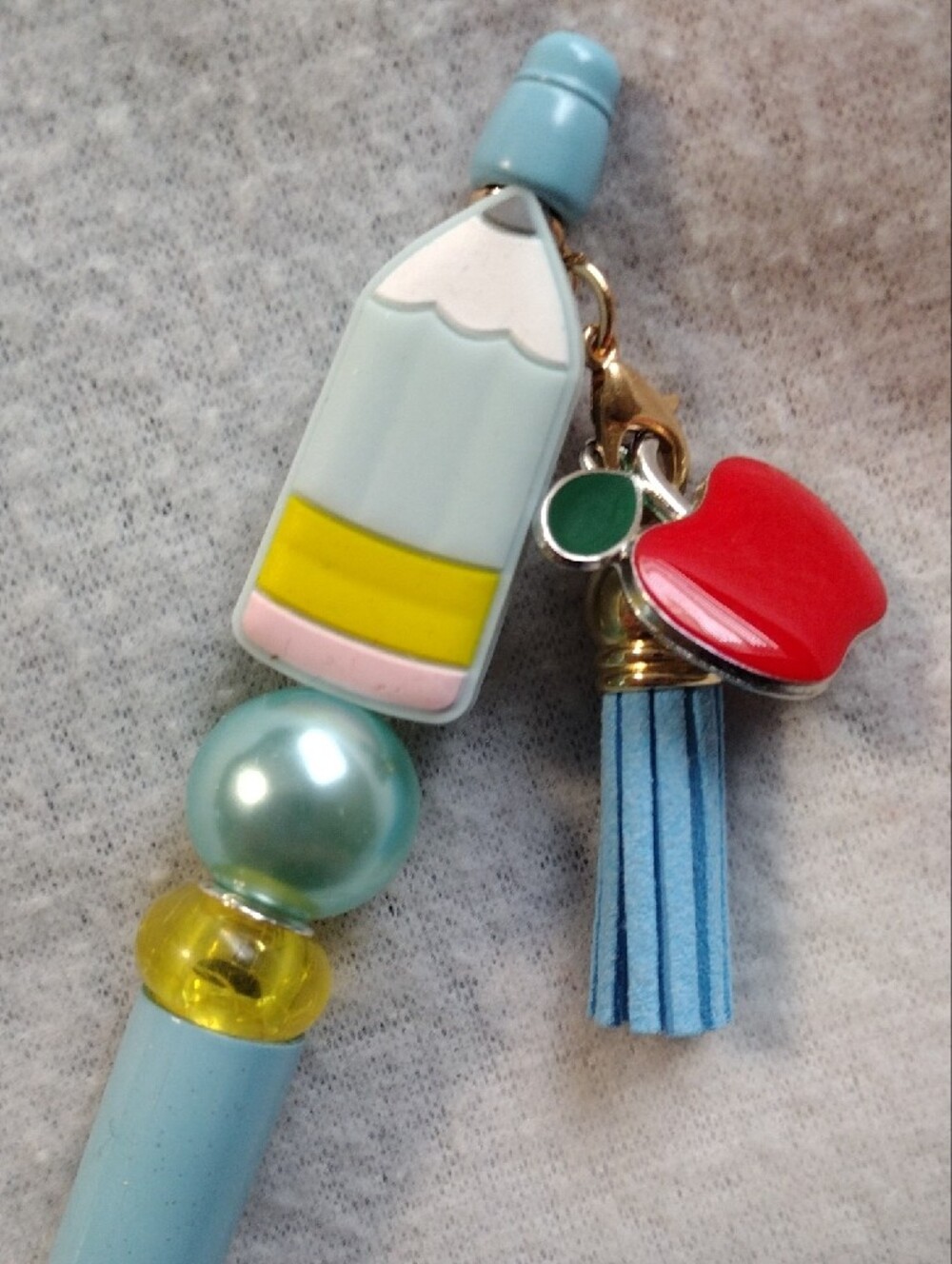 Stylish Light Blue Pencil Charm Ballpoint Pen with Apple Tassel - Picture 2 of 2